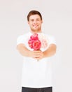 Young man holding bouquet of flowers Royalty Free Stock Photo