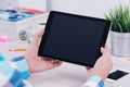 Young man holding ipad digital tablet on table desk Royalty Free Stock Photo