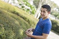 Young man holding digital tablet