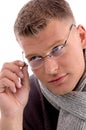 Young man holding eyewear Royalty Free Stock Photo