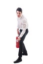 Young Man Holding Fire Extinguisher Royalty Free Stock Photo