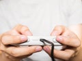 A young man holding game controller playing video games Royalty Free Stock Photo