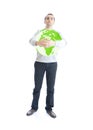 Young man holding green planet earth
