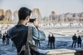 Young Man Holding a Guide Outside Historic Building Royalty Free Stock Photo