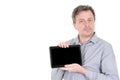 Young man holding in hands tablet computer with blank screen black isolated over white background Royalty Free Stock Photo