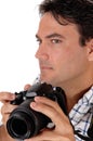 A young man holding his camera for a shoot Royalty Free Stock Photo