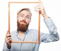 Young man holding picture frame Royalty Free Stock Photo