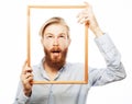 Young man holding picture frame Royalty Free Stock Photo