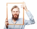 Young man holding picture frame Royalty Free Stock Photo