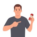Young man holding and pointing coke, say no to coke, sugar, and fat Royalty Free Stock Photo
