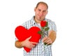 Young man holding red heart Royalty Free Stock Photo