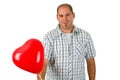 Young man holding red heart Royalty Free Stock Photo