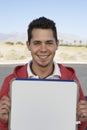 Young Man Holding Sign Board Royalty Free Stock Photo