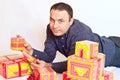 Young man holding some gifts Royalty Free Stock Photo