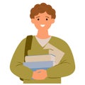 A young man is holding a stack of books and smiling Royalty Free Stock Photo