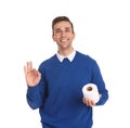 Young man holding toilet paper roll Royalty Free Stock Photo