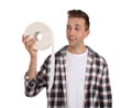 Young man holding toilet paper roll Royalty Free Stock Photo