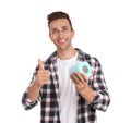 Young man holding toilet paper roll Royalty Free Stock Photo