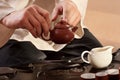 A young man holds a Chinese tea ceremony Royalty Free Stock Photo