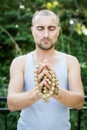 Young man holds a rosary in his hands and pray Royalty Free Stock Photo