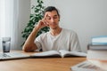 Young man at home while  distance learning Royalty Free Stock Photo