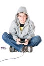 Young man in hood with a joystick Royalty Free Stock Photo