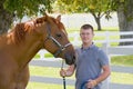 Young Man with Horse Royalty Free Stock Photo