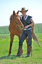 Young man and horse Royalty Free Stock Photo