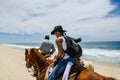 Young man horseback riding in Cabo san Lucas, Baja California Royalty Free Stock Photo