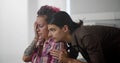 Young man hugging and comforting sad wife in wheelchair Royalty Free Stock Photo