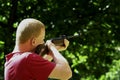 Young man with a hunting rifle Royalty Free Stock Photo
