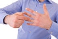 Man indicating his wedding ring.