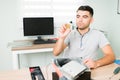 Young man installing a microchip in a computer