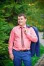 Young man with a jacket over his shoulder Royalty Free Stock Photo