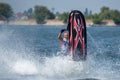 Young Man on Jet Ski-Water Sports in the summer having fun on the beach