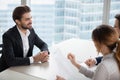 Young man at job interview answering questions of employer. Royalty Free Stock Photo