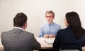 Young man during job interview and members of managemen Royalty Free Stock Photo