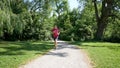 Young man jogging in the park in Canada