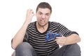 Young man with joystick and angry Royalty Free Stock Photo