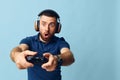 Young man joystick control gamer playing console leisure game fun man entertainment video Royalty Free Stock Photo