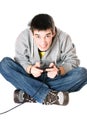 Young man with a joystick for game console Royalty Free Stock Photo