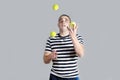 Young man juggling Royalty Free Stock Photo