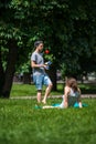 Young man juggling in the park