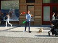 The young man juggling in the street. Prague,