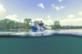 Young Man Kayaking on Lake, Kayaking Underwater View, Split Shot Royalty Free Stock Photo