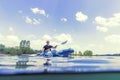 Young Man Kayaking on Lake, Kayaking Underwater View, Split Shot Royalty Free Stock Photo