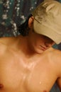 Young man in a khaki hat Royalty Free Stock Photo