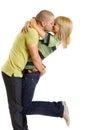 Young man kissing his girlfriend in the air Royalty Free Stock Photo