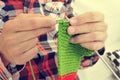 Young man knitting Royalty Free Stock Photo