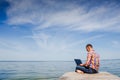 Young man with laptop working outdoor Royalty Free Stock Photo